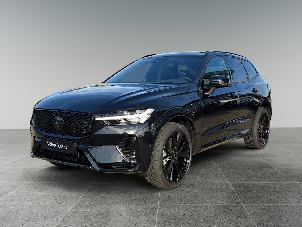 Volvo XC60 - T6 Plug-in hybrid AWD Ultra Black Edition | Trekhaak elektr. | Panoramadak | Guard alarm - AutoWereld.nl