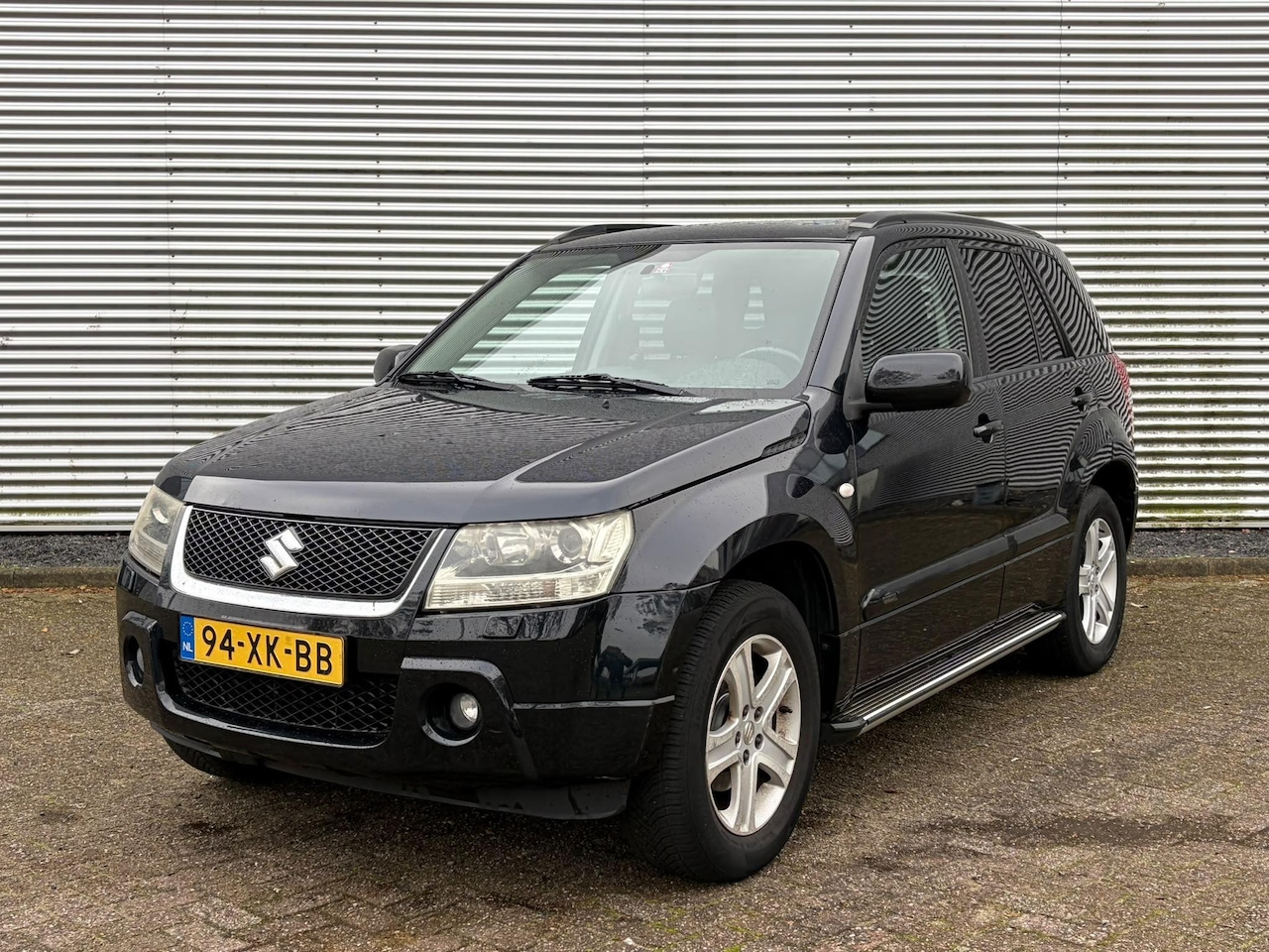 Suzuki Grand Vitara - 2.0-16V High Executive 2.0-16V High Executive , AUTOMAAT, 4X4, LEDER, AIRCO, SCHUIFDAK, TREKHAAK, CRUISE CONTROLE - AutoWereld.nl