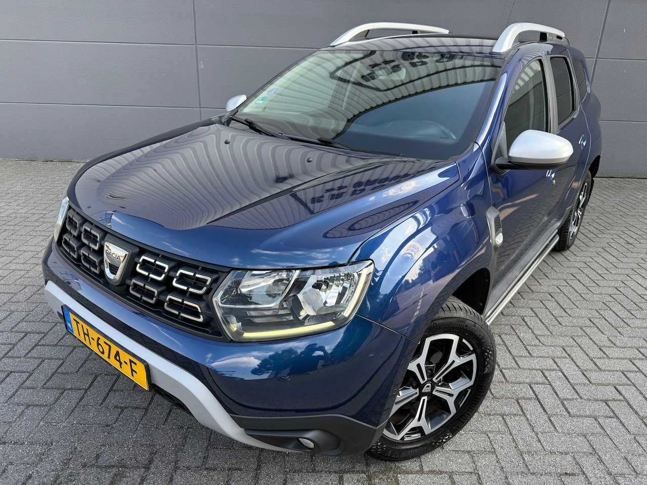 Dacia Duster - 1.2 TCe Prestige*Camera*NAVI*Trekhaak*Climat-Airco*Park-Sensoren*Velgen - AutoWereld.nl