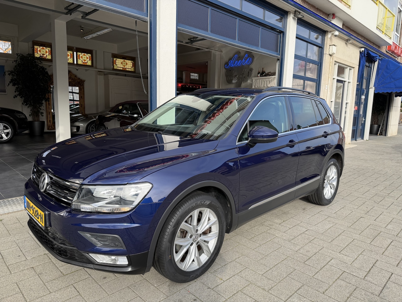 Volkswagen Tiguan - 1.4 TSI ACT Comfortline CLIMA/CRUISE/NAVI - AutoWereld.nl