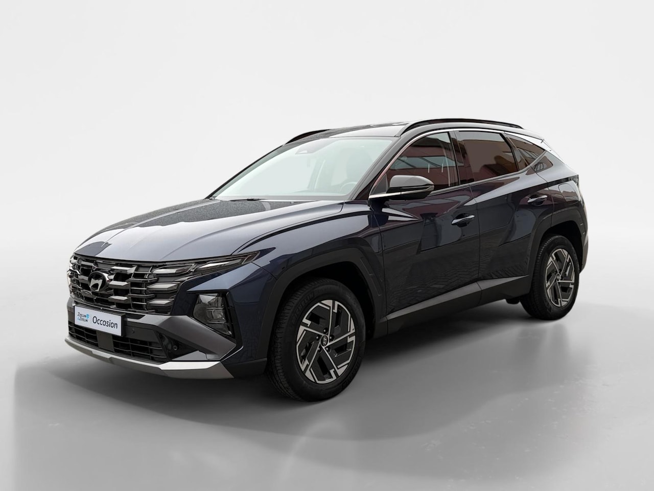 Hyundai Tucson - 1.6 T-GDI HEV Comfort Smart | Navigatie | Achteruitrijcamera | Stuur-/Stoelverwarming | Pa - AutoWereld.nl