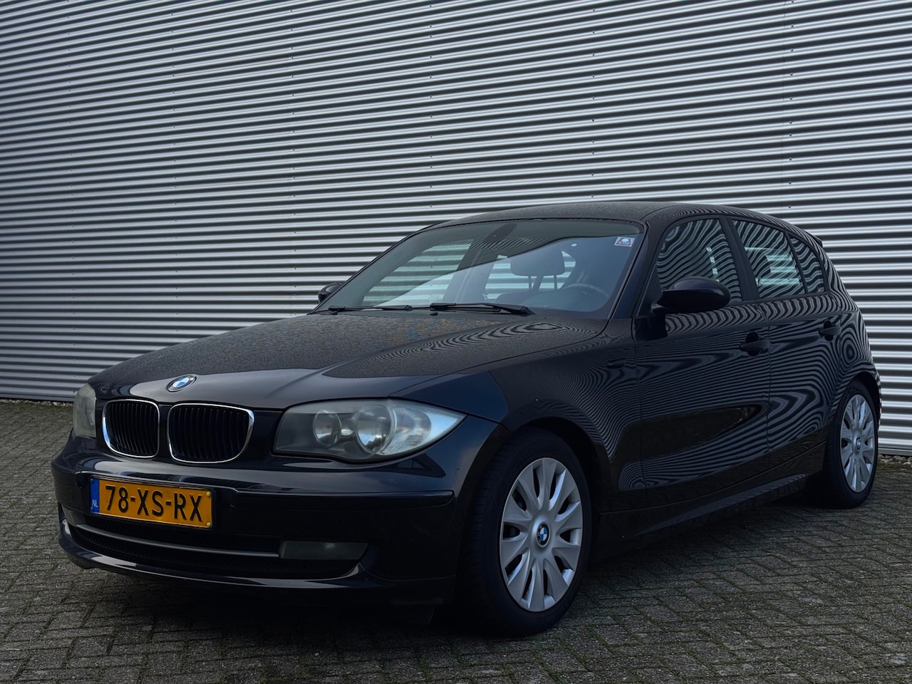 BMW 1-serie - 116i High Executive | Airco | Sportstoelen | Elektrische ramen | Cruise control | 2 sleute - AutoWereld.nl