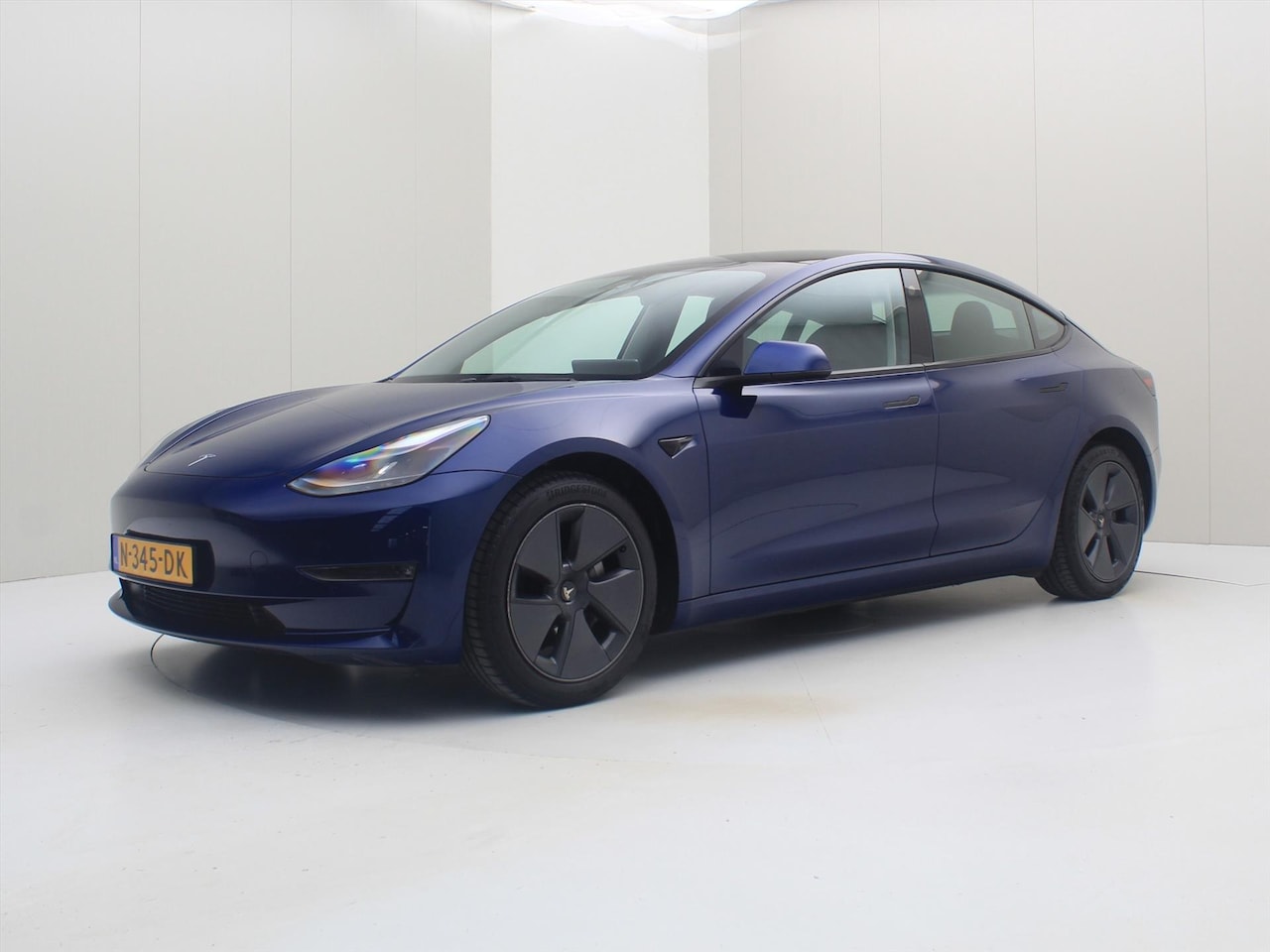 Tesla Model 3 - Long-Range AWD 351pk 75 kWh FACELIFT 92,9% SoH [ WARMTEPOMP+FSD+620KM WLTP+PREMIUM AUDIO ] - AutoWereld.nl