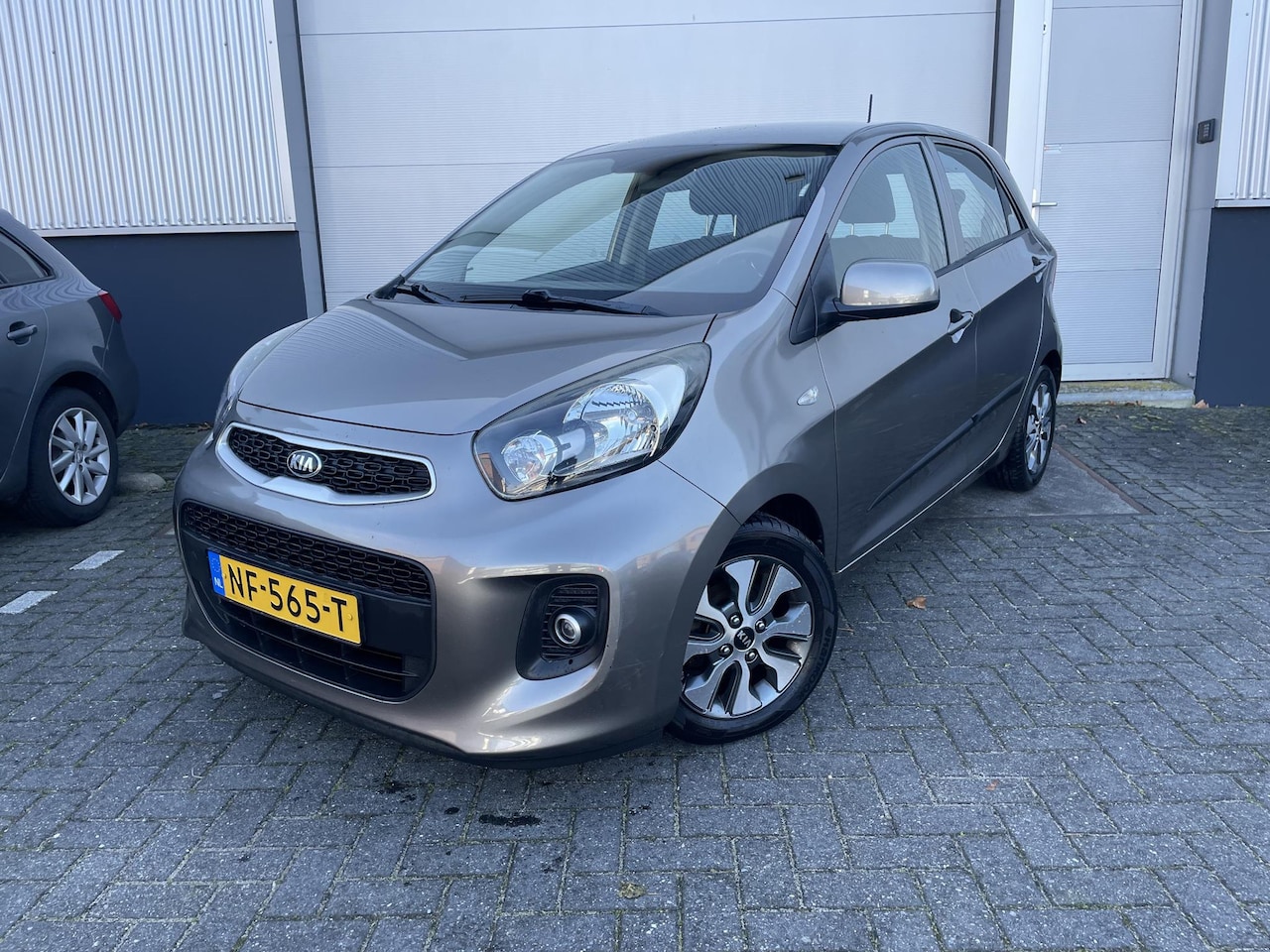 Kia Picanto - 1.0 CVVT ComfortPlusLine Navigator 1.0 CVVT ComfortPlusLine Navigator , 1e Eigenaar, 49.000 Km, Navigatie - AutoWereld.nl