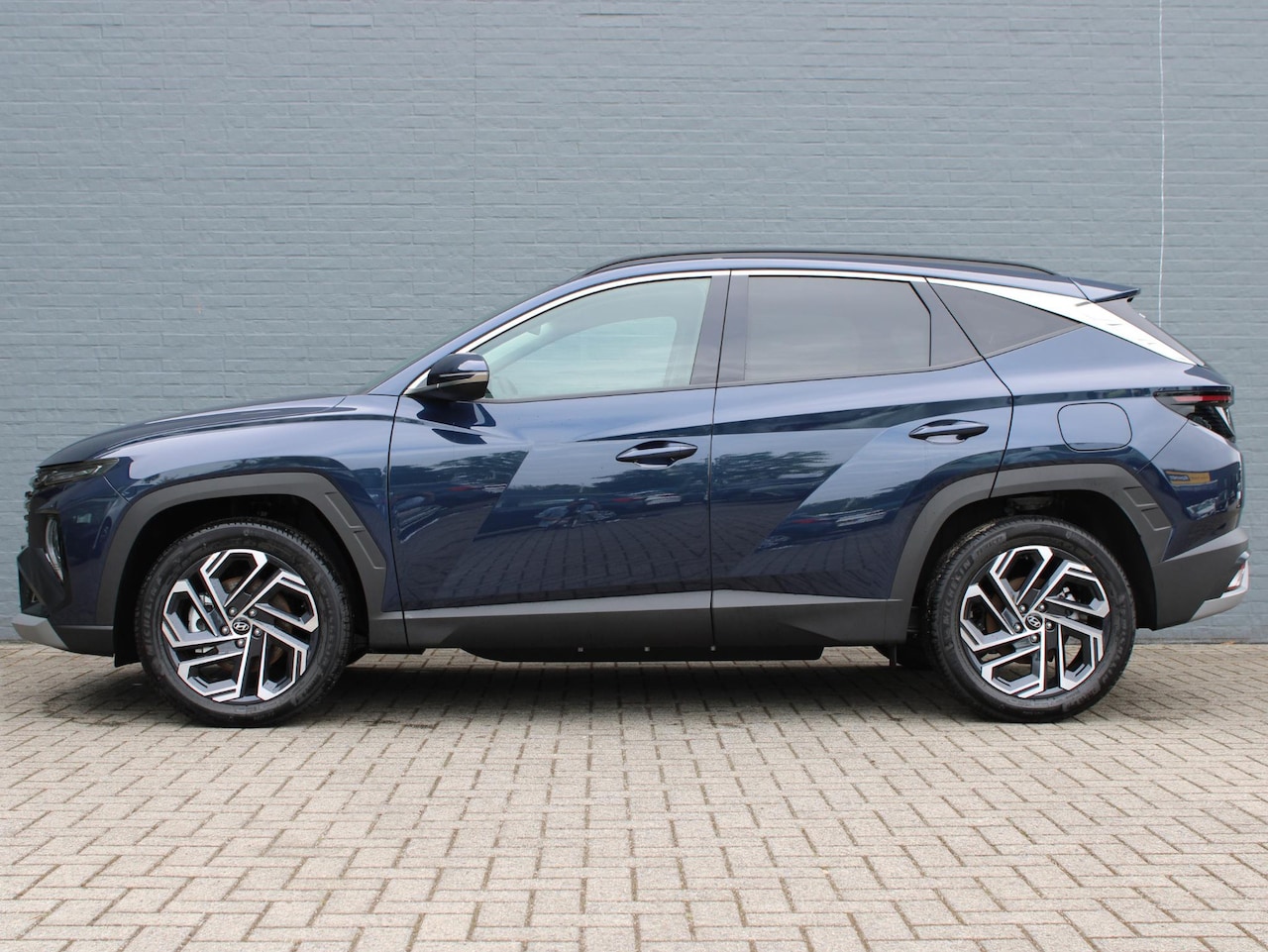 Hyundai Tucson - 1.6 T-GDI HEV Premium 1.6 T-GDI HEV Premium - AutoWereld.nl