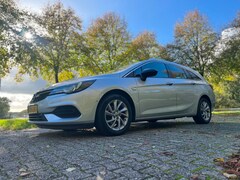 Opel Astra Sports Tourer - 1.4 Business Elegance AUTOMAAT+NL-AUTO+NAP+1EIG+NAVI+TREKHAAK+CAMERA+STOELVERMING+INCL BTW