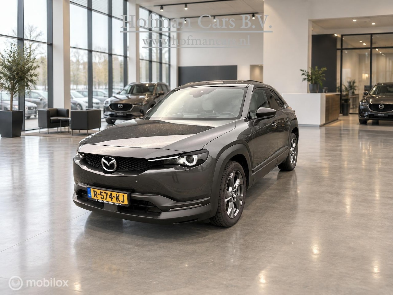 Mazda MX-30 - e-SkyActiv EV 145 Makoto 36kWh | SOH 95% | Schuifdak | HUD | 360 Camera | Bose - AutoWereld.nl