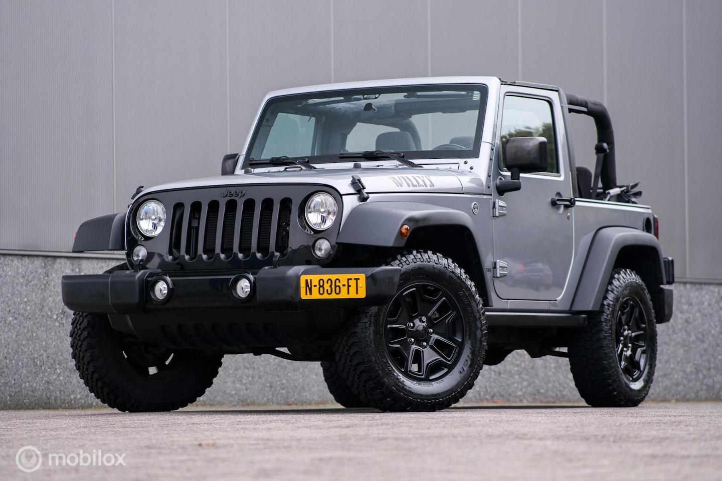 Jeep Wrangler - 3.6 V6 Willys automaat 2016 | 4x4 | Lage km stand | Airco | Softtop | Nieuwe APK | - AutoWereld.nl