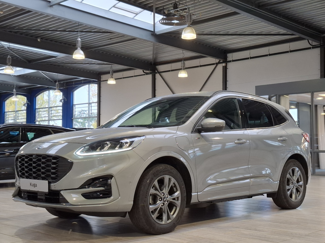Ford Kuga - 2.5 PHEV 225 pk ST-Line X | Trekhaak | Winter Pack | Adapt. cruise | SOH 88,7% | El. a. kl - AutoWereld.nl