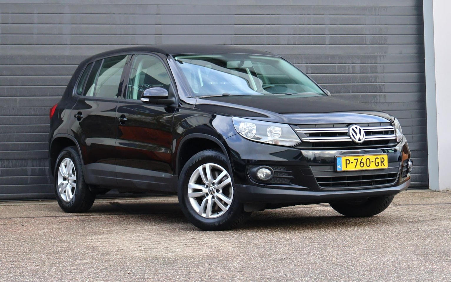 Volkswagen Tiguan - 1.4 TSI Sport&Style Clima/PDC/Navi/Netjes/Trekhaak - AutoWereld.nl