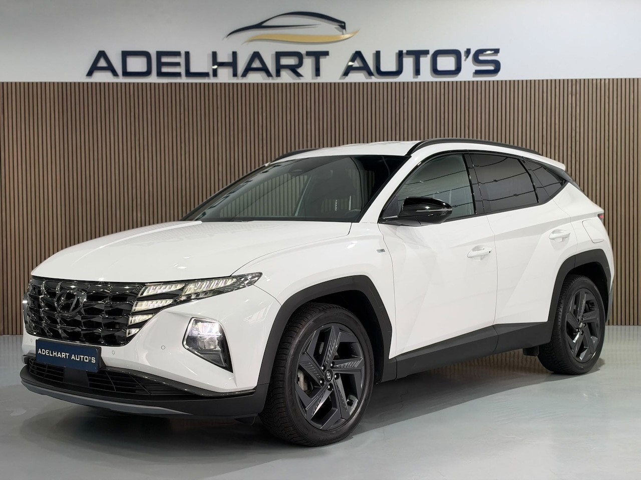 Hyundai Tucson - 1.6 T-GDI MHEV Comfort Smart Automaat / Keyless / Navigatie full map / Camera / Krell / Cr - AutoWereld.nl