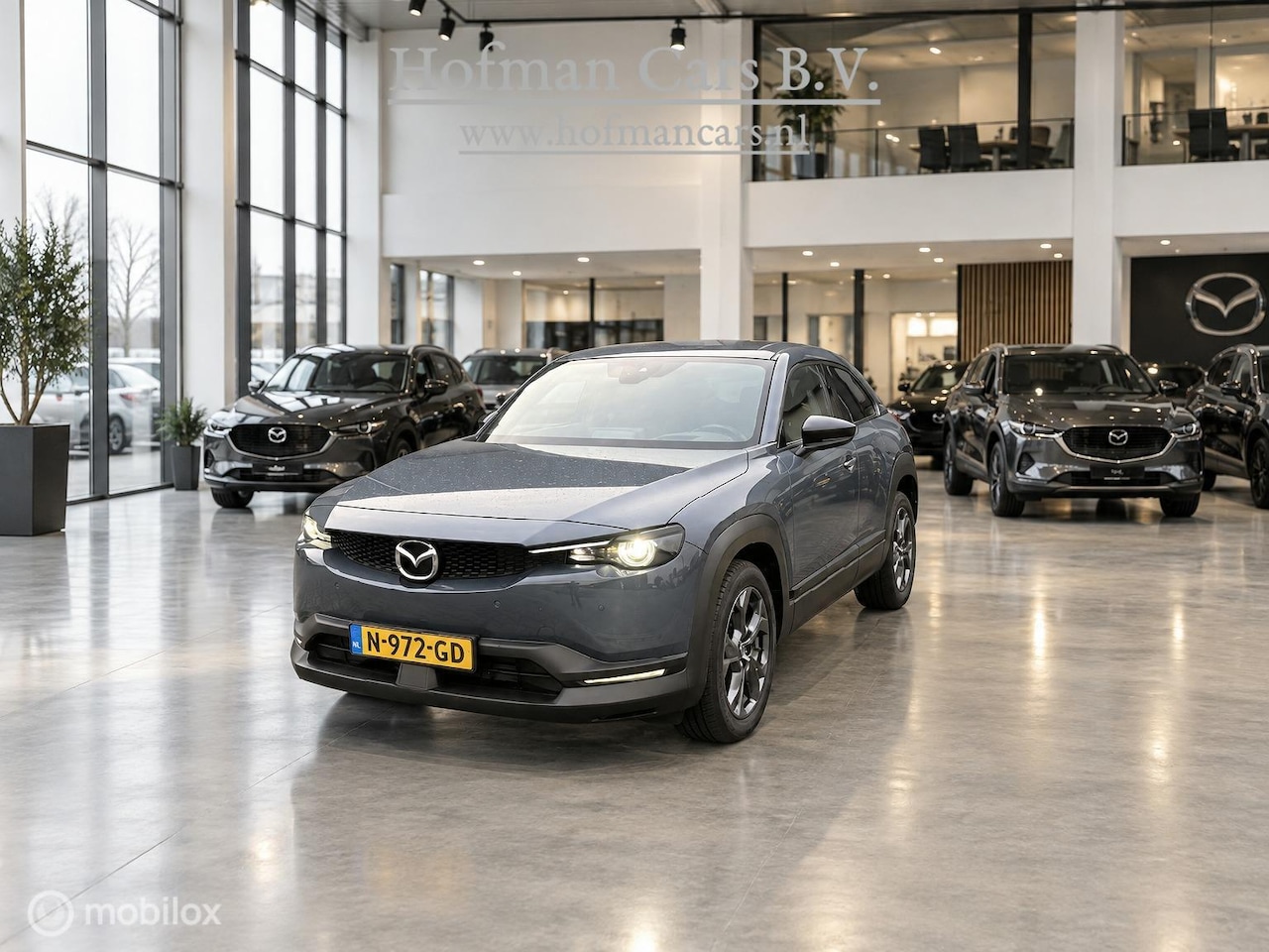 Mazda MX-30 - e-SkyActiv 145 36 kWh | SOH 93% | 51.794 KM | HUD | Memory Seats | Stoel- en Stuurverwarmi - AutoWereld.nl