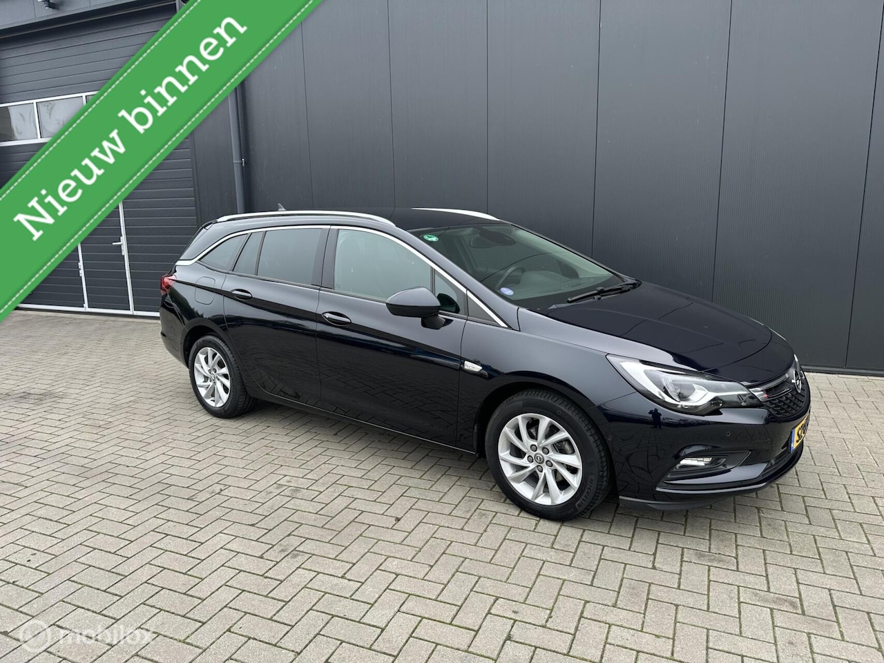 Opel Astra Sports Tourer - 1.4 Innovation Full Option Trekhaak - AutoWereld.nl