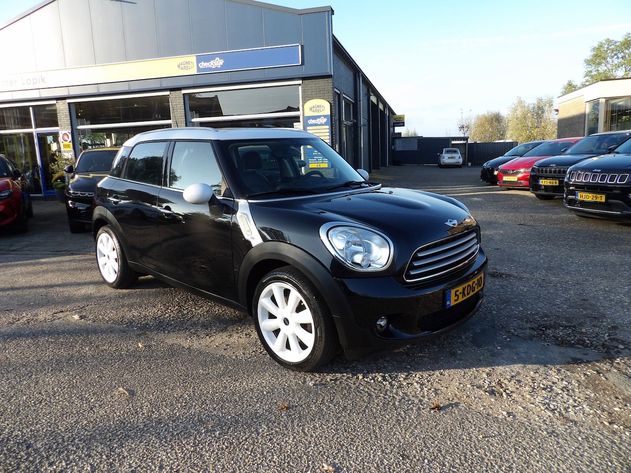 MINI Countryman - 1.6 Cooper Holland Street - AutoWereld.nl