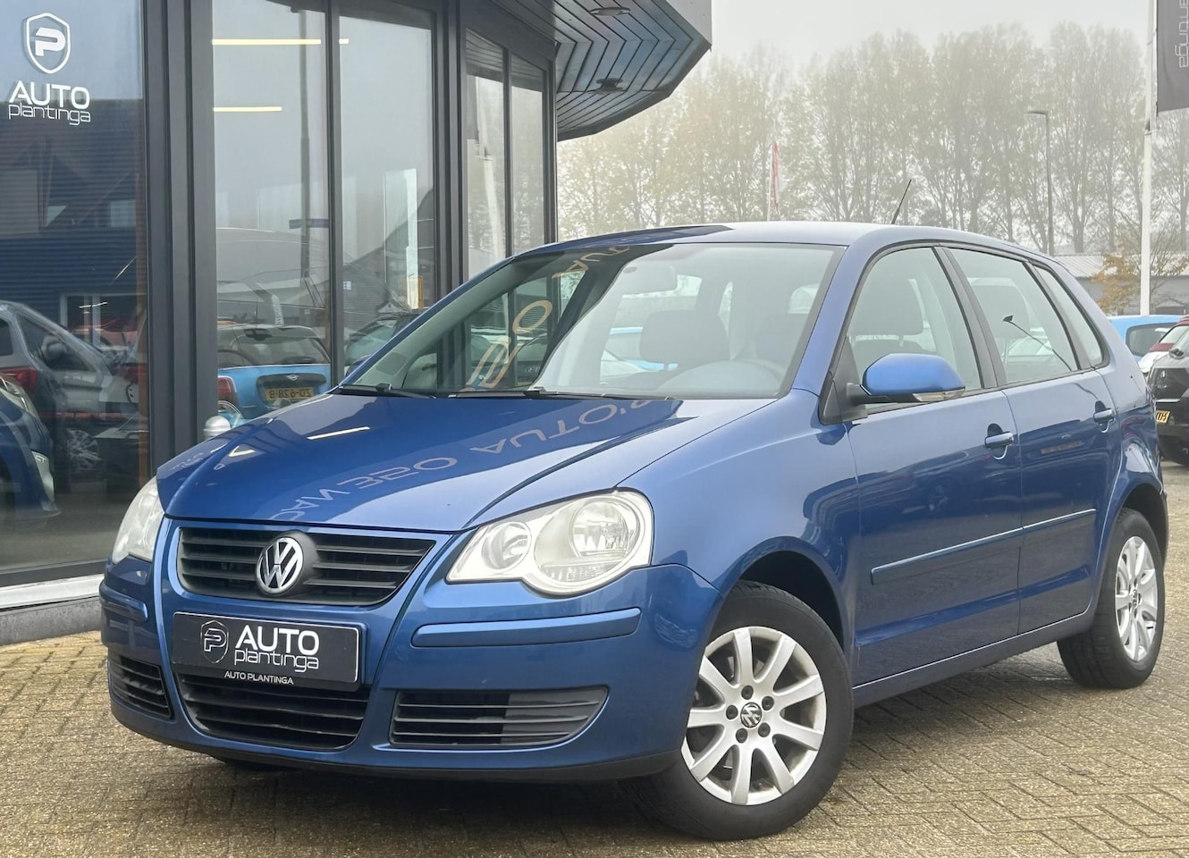 Volkswagen Polo - 1.4-16V Optive 80PK | NL AUTO | NAP | Volledige Onderhoudshistorie | Trekhaak | Airco | Bl - AutoWereld.nl