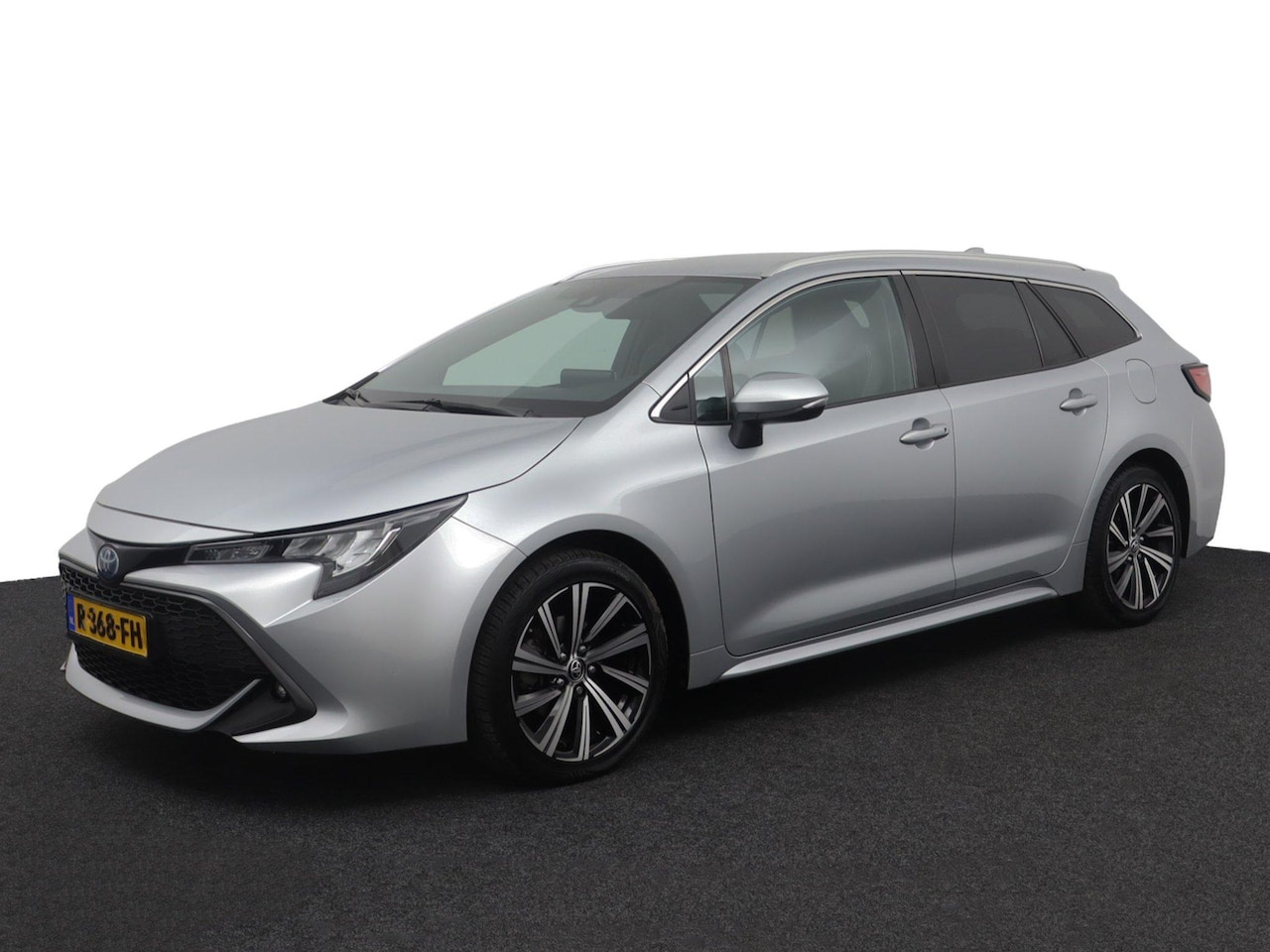 Toyota Corolla Touring Sports - 1.8 Hybrid Business Plus | Leder - Stof bekleding | Stoelverwarming | Keyless | - AutoWereld.nl