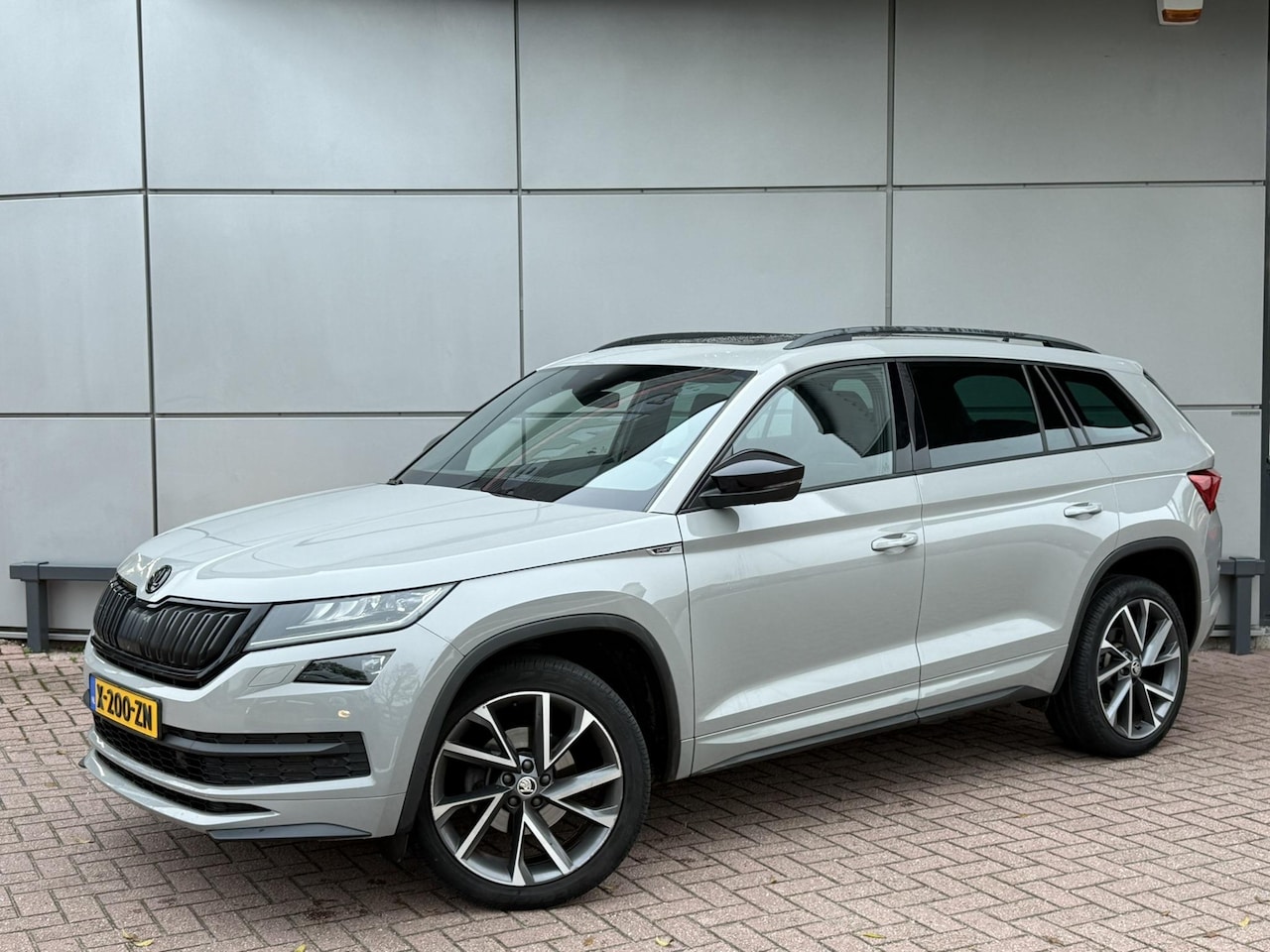 Skoda Kodiaq - 1.5 TSI Sportline | Pano | Trekhaak | Sportstoelen - AutoWereld.nl