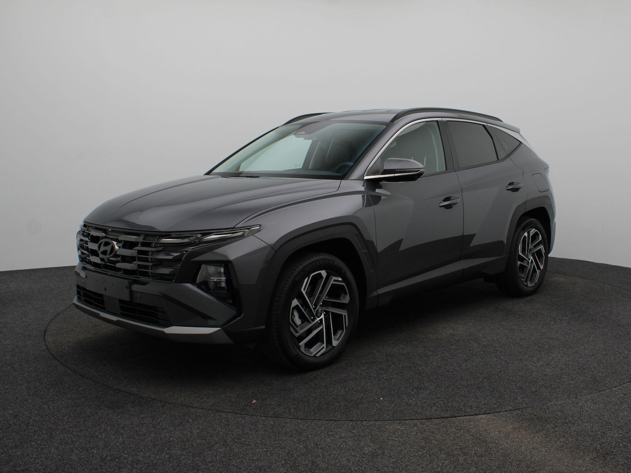 Hyundai Tucson - 1.6 T-GDI PHEV Premium | Stoelverwarming + verkoeling | 360 Camera | Adaptieve Cruise | Cl - AutoWereld.nl