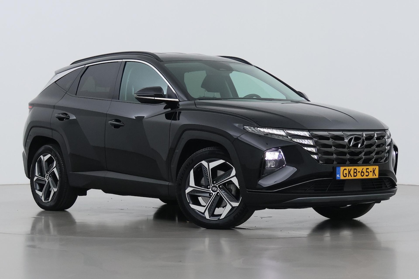 Hyundai Tucson - 1.6 T-GDI HEV Comfort | Krell Audio | Leder | Stoelverwarming + Ventilatie | 19 inch - AutoWereld.nl