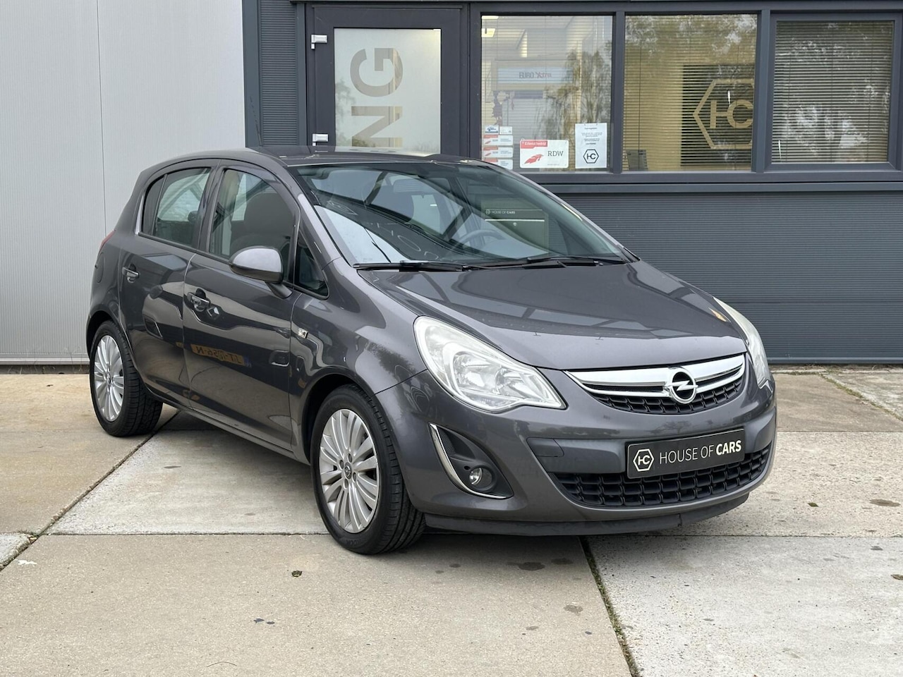 Opel Corsa - 1.4 16V Cosmo 5-Deurs Airco Cruise Navi NAP - AutoWereld.nl