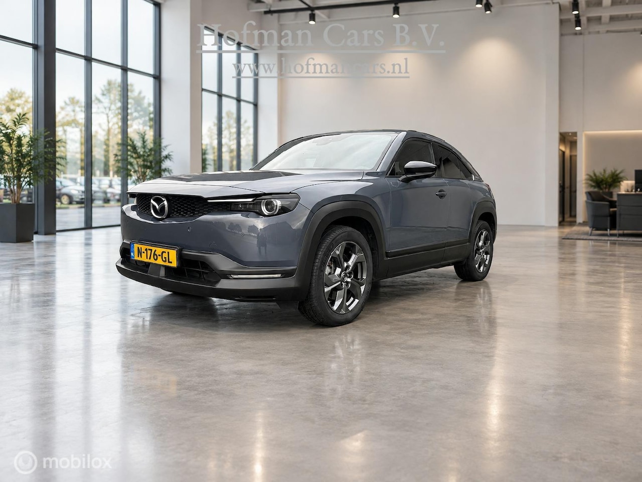 Mazda MX-30 - e-SkyActiv 145 36 kWh | SOH 94% | Jeans Grijs | HUD | Memory Seats | Keyless | Half leder - AutoWereld.nl