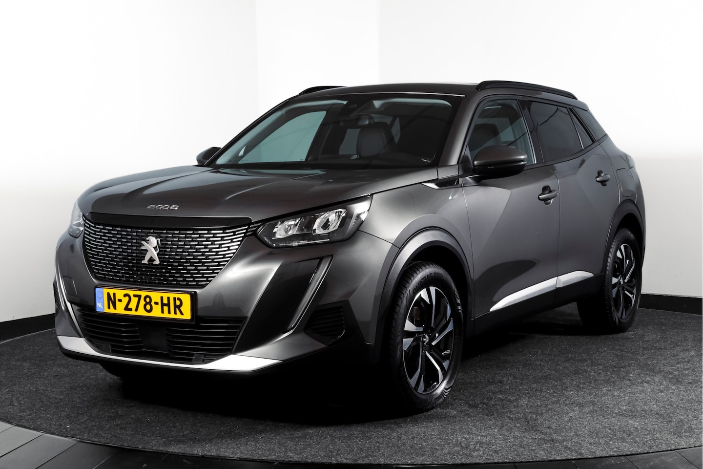 Peugeot 2008 - 1.2 PureTech Blue Lease Allure 131 PK | Trekhaak | Cruise | PDC | Camera | Carplay/Android - AutoWereld.nl