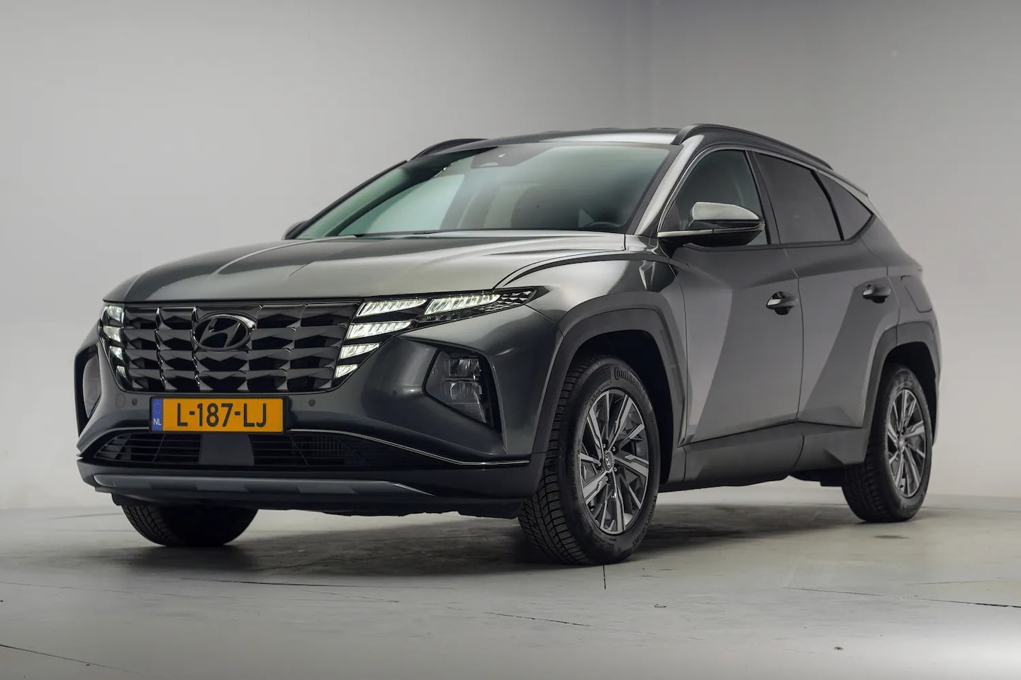 Hyundai Tucson - 1.6 T-GDI HEV Comfort Smart Aut. [ Adapt.cruise Krell-Audio Camera ] - AutoWereld.nl