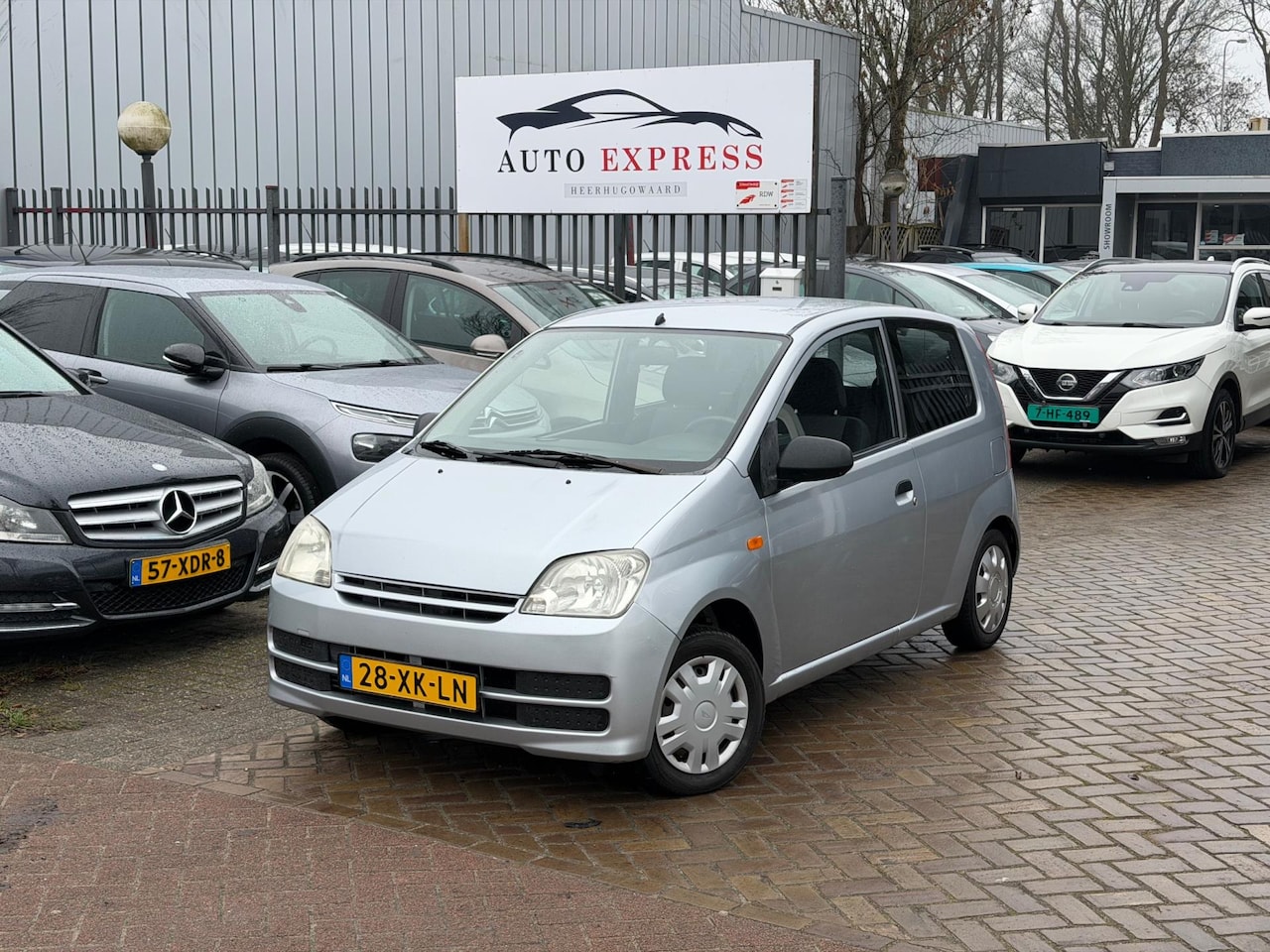 Daihatsu Cuore - 1.0-12V Tokyo/Automaat/Stuurbekrachtiging/Abs/Nap/Apk - AutoWereld.nl