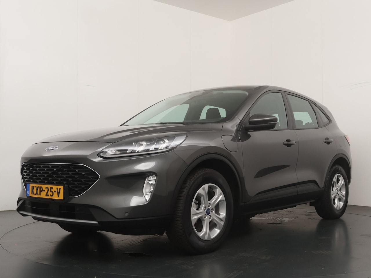 Ford Kuga - 2.5 PHEV Cool & Connect | Winter Pack | SOH 87,6 % | Navi | Clima | Cruise | 4 seiz. bande - AutoWereld.nl