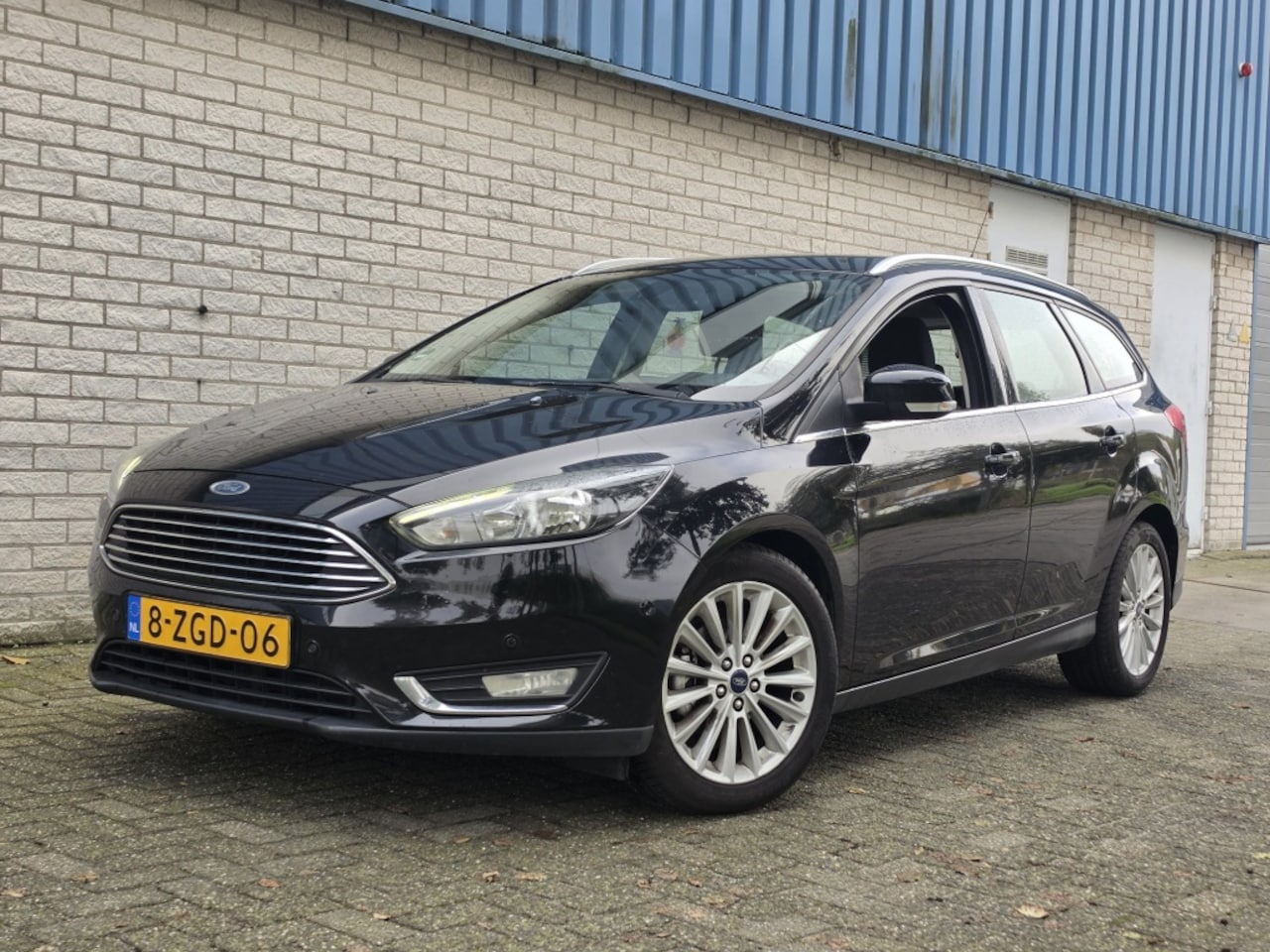 Ford Focus Wagon - 1.0 First Edition Navi/Cruise/Boekjes ✅ - AutoWereld.nl