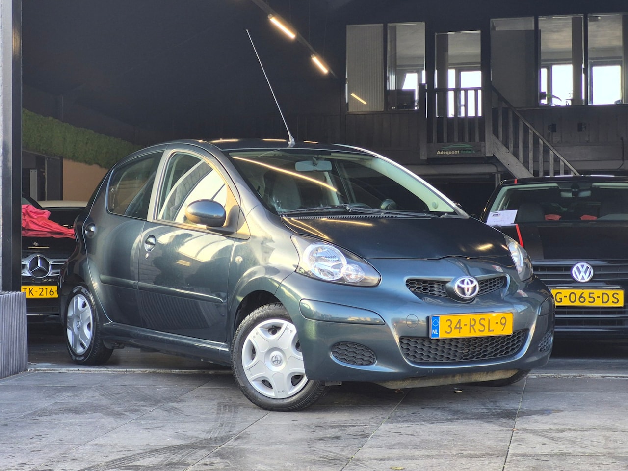 Toyota Aygo - 1.0-12VAspiration Green Navigator|Airco|El.Ramen - AutoWereld.nl