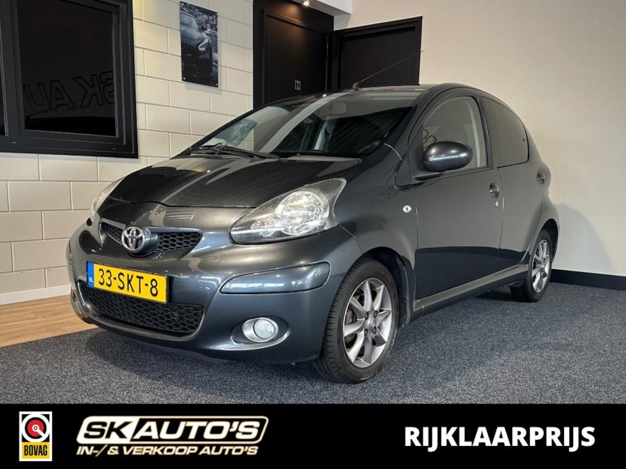Toyota Aygo - 1.0-12V DYN. NAV.l AUTOMAAT l UNIEK l NAVI l LMV l - AutoWereld.nl