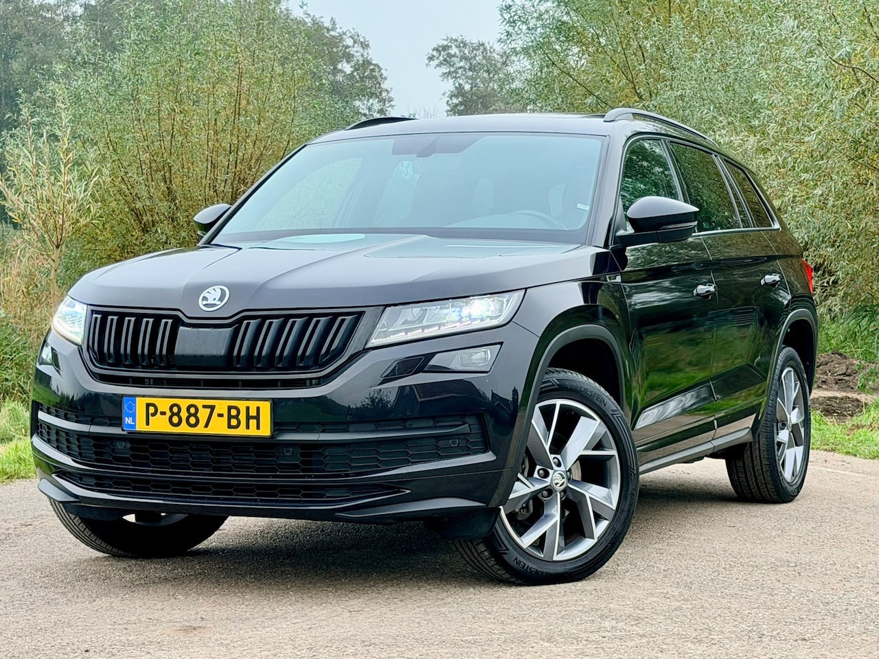 Skoda Kodiaq - 1.5 TSI Business Sportline 7p. Incl. BTW / 1 Eigenaar / Schuifdak/ Clima / Navi / Camera / - AutoWereld.nl