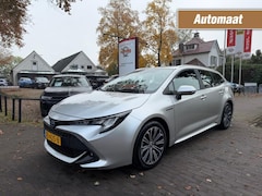Toyota Corolla Touring Sports - 1.8 HYBRID FIRST EDITION / CARPLAY / CAMERA / NAVI / ADAP. CRUISE / AFN. TREKHAAK / LED /