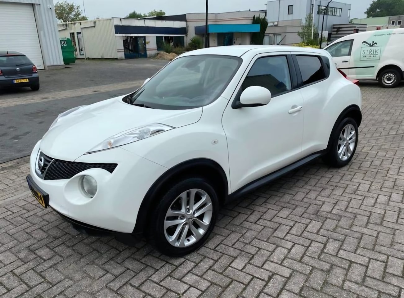 Nissan Juke - 1.6 Tekna full opties - AutoWereld.nl