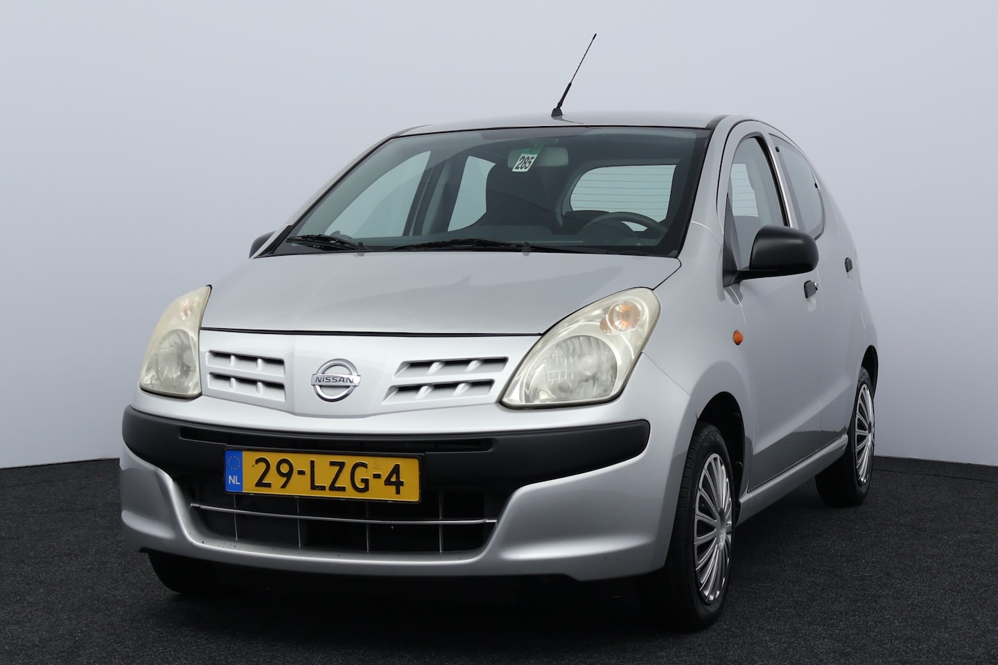 Nissan Pixo - 1.0 Visia/ TREKHAAK!/ 5-Drs/ Stuurbekr./ Bumpers in kleur/ Isofix/ Radio-CD-AUX/ Getint gl - AutoWereld.nl