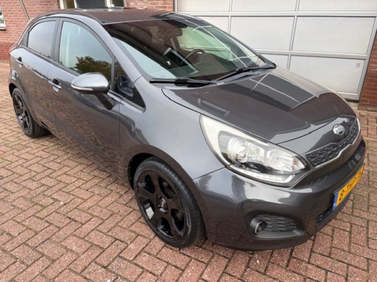Kia Rio - 1.2 CVVT Super Pack Trekhaak- Privateglass - CruiseControle - AutoWereld.nl