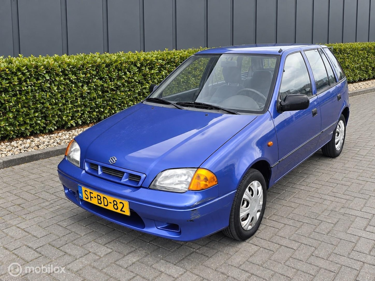 Suzuki Swift - 1.0 GLX 5D | AUTOMAAT | APK 16-04-2027 - AutoWereld.nl