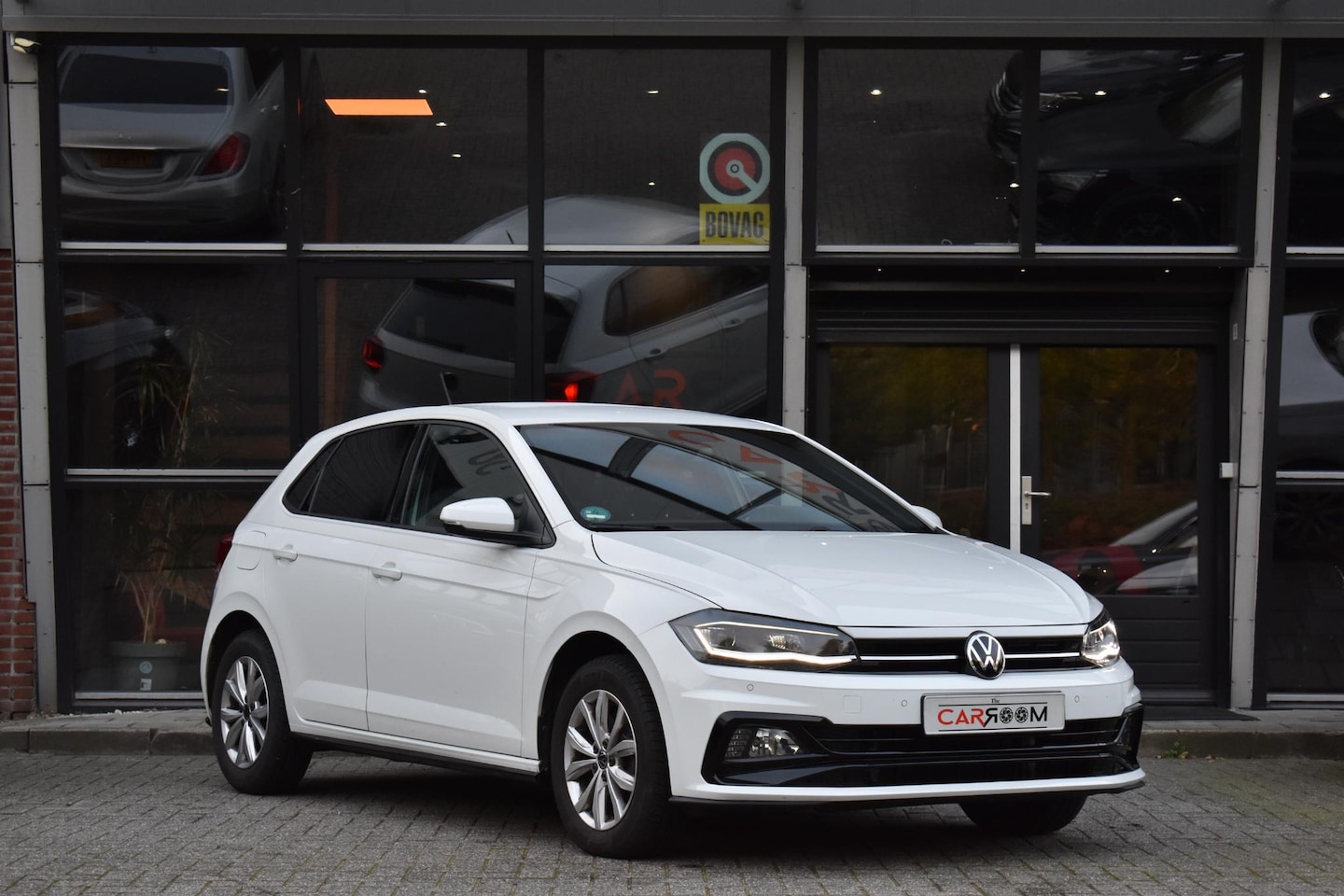 Volkswagen Polo - 1.0 TSI Highline LED R Line PDC DSG - AutoWereld.nl