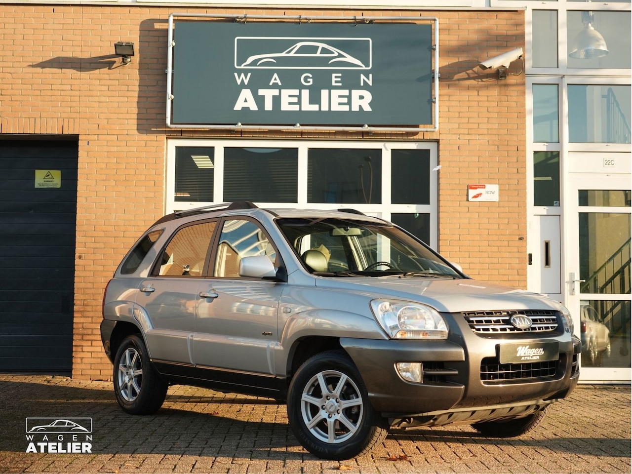 Kia Sportage - 2.0 CVVT Comfort|4WD|Clima|Trek H| Elek ramen| - AutoWereld.nl