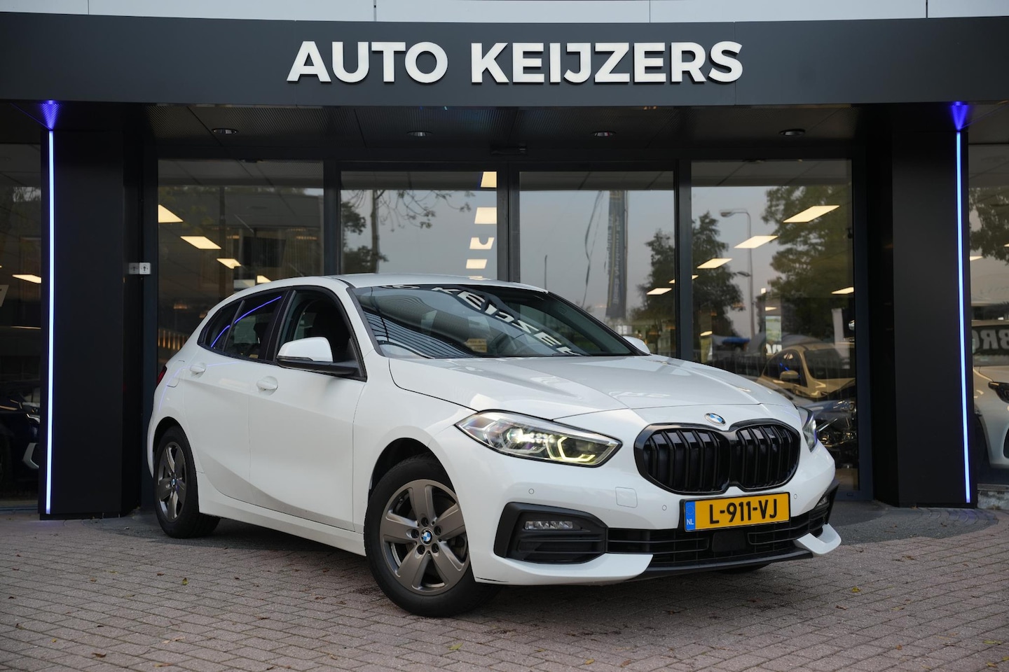 BMW 1-serie - 118d High Executive Automaat Led Stoelverwarming - AutoWereld.nl