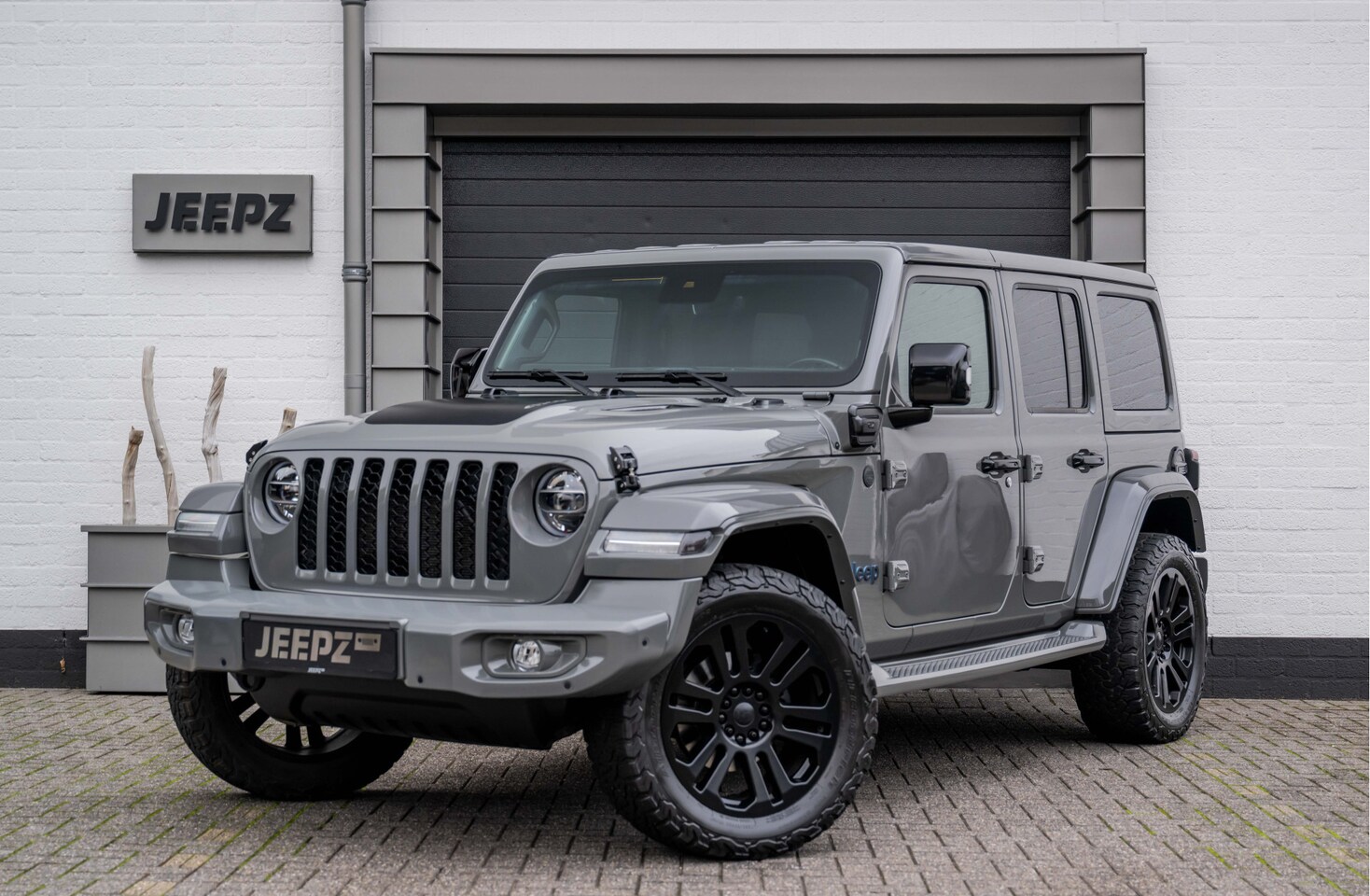 Jeep Wrangler Unlimited - 4xe 380 Sahara - 20" Lmv / Jeepz Edition / BTW auto - AutoWereld.nl