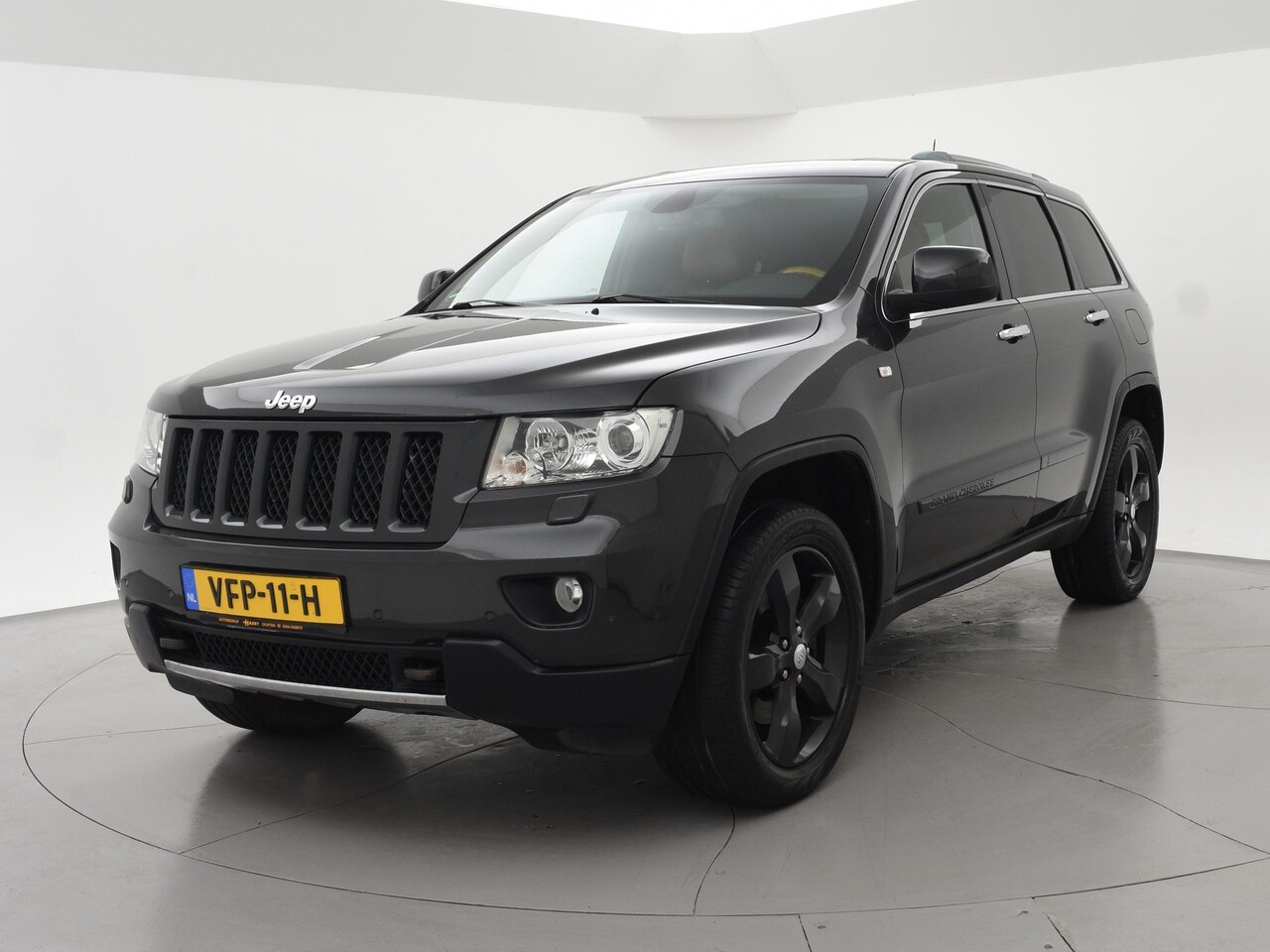 Jeep Grand Cherokee - 3.6 V6 OVERLAND GRIJS KENTEKEN + PANORAMA | LEDER | LUCHTVERING | TREKHAAK | CAMERA | 20 I - AutoWereld.nl