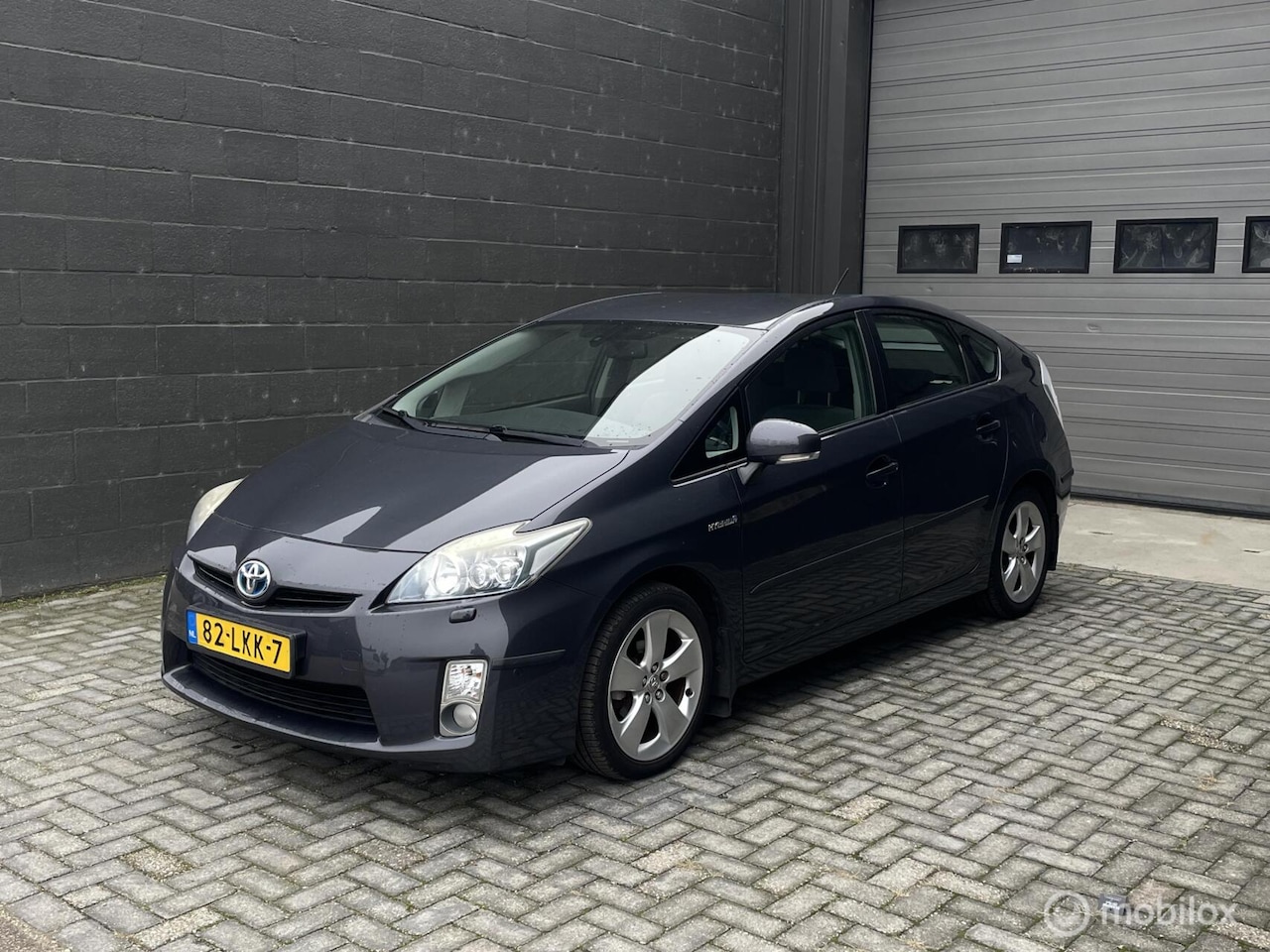 Toyota Prius - 1.8 Dynamic | AIRCO | Navi | HUD | LED | Camera | PDC | Nieuwe APK | - AutoWereld.nl