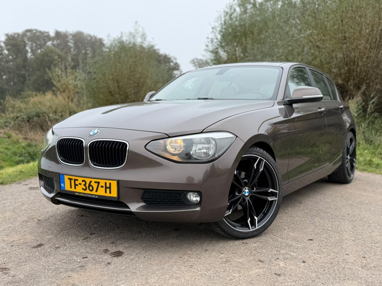 BMW 1-serie - 116d EDE Executive / Airco / Navigatie / CC / Beige Leder / APK tot 28-08-2027 - AutoWereld.nl