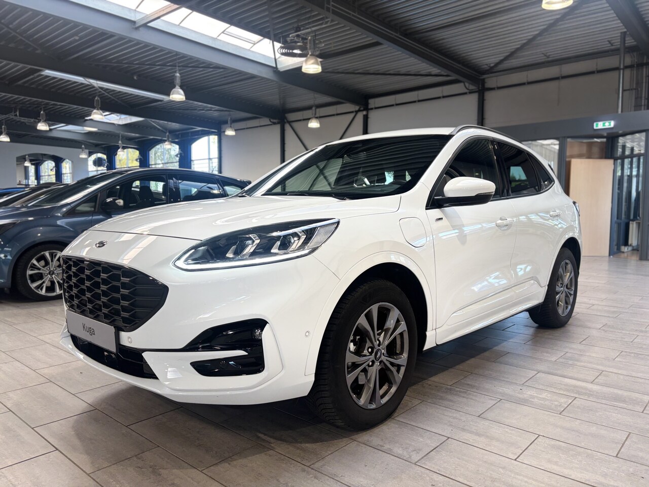 Ford Kuga - 2.5 PHEV 225 pk ST-Line X | Winter Pack | SOH 89,9% | Camera's | Adapt. cruise | Adapt. LE - AutoWereld.nl