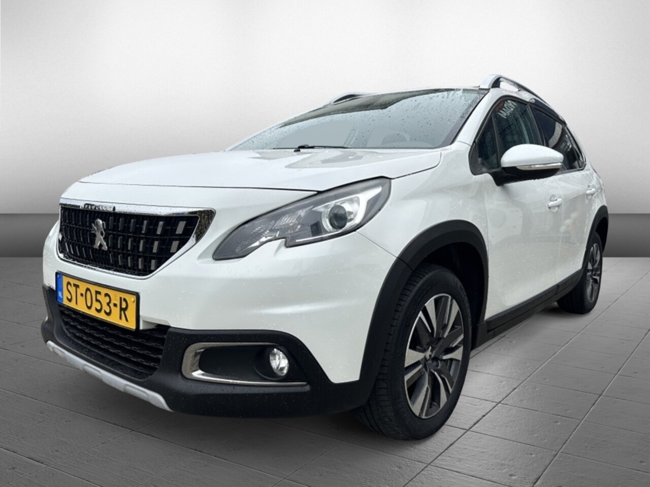 Peugeot 2008 - 1.2 Allure | Eerste berijder | Motor vervangen | Trekhaak | - AutoWereld.nl